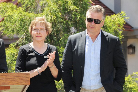 Alexandra Giambruno, the head of East Hampton Library's children's services department, with Alec Baldwin.