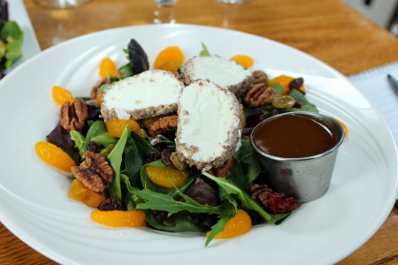 Crusted goat cheese roundels.