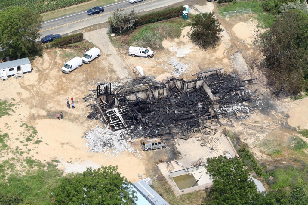 The site of the Seven Ponds Road mansion in Water Mill the day after the fire. Photo credit: Cully/EEFAS