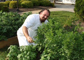 Chef Arie Pavlou in his garden at Bistro Été in Water Mill last summer.