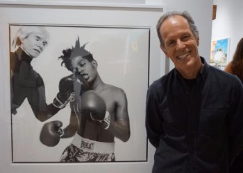 Michael Halsband with his photo of Andy Warhol and Jean-Michel Basquiat