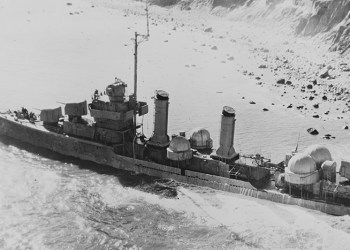 The USS Baldwin aground at Montauk Point shortly after she came to rest. The mothballed destroyer had broken free from her towline on April 16, 1961 and drifted ashore.