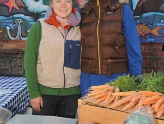 Karin Bellemare (Sunset Beach Farm) and Ana Nieto (Fair Foods Farmers Market Manager) in front of BayBurger's famous mural Blurb: The famous Sag Harbor Farmers Market has made its annual end-of-season move to its off-season location next to BayBurger in Sag Harbor