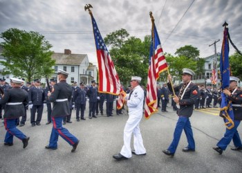 Old Glory was held high along the Memorial Day Parade route.