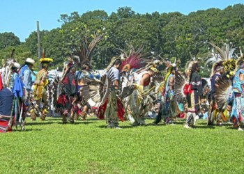 The drums intensify as the dancers begin the Grand Entry at the 2015 Shinnecock Powwow.