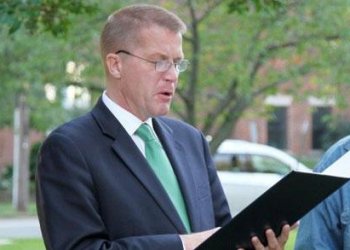 Southold Town Supervisor Scott Russell reads proclamation at 375th anniversary time capsule burial