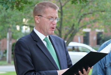 Southold Town Supervisor Scott Russell reads proclamation at 375th anniversary time capsule burial