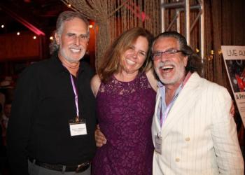 Steven J Bergerson, past president of The Retreat Nicole Behrens, and current president Richard Demato of RJD Gallery