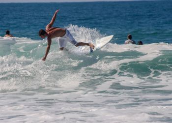 Surfer riding the waves