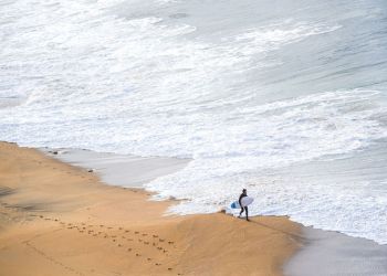 surfer on sand