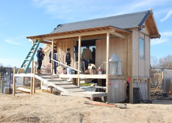 Volunteers work on the Conscience Point Shellfish Hatchery in North Sea.