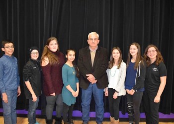 The Hampton Bays School District honored Mr. Frederick Dacierno for his service at a ceremony March 17. He is pictured with Hampton Middle School eighth-grade representatives.