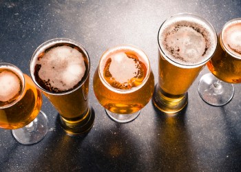 Beer glasses on dark table