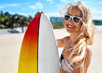 Summer Travel Beach Vacation. Happy Woman With Surfboard. Summer