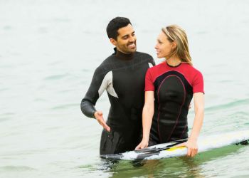 surfing couple