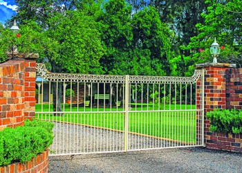 Brick fence and metal gate