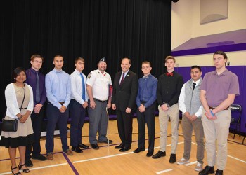 Daniel Stebbins with Lee Zeldin and Hampton Bays students, Photo: Courtesy Syntax