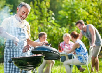 Family grilling outside