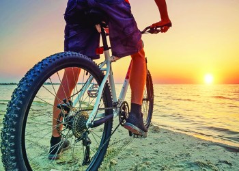 Biking is a great way to explore while keeping your body and the Earth healthy, Photo: Levgenii Biletskyi/123RF