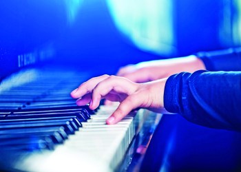 A pianist tickling the ivories, Photo: Olegdudko/123RF