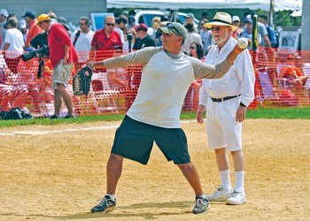 John Franco pitching with Dan Rattiner as the ump