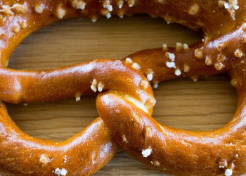 78756120 - salted pretzel closeup. shallow depth of field.