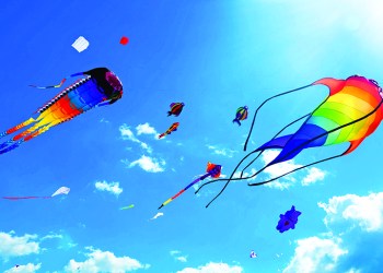 43612941 - various kites flying on the blue sky in the kite festival