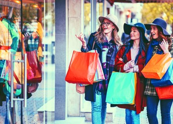 Young women enjoying a window shopping