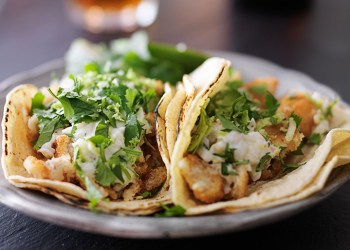 Fish tacos with slaw, lemon zest and cilantro