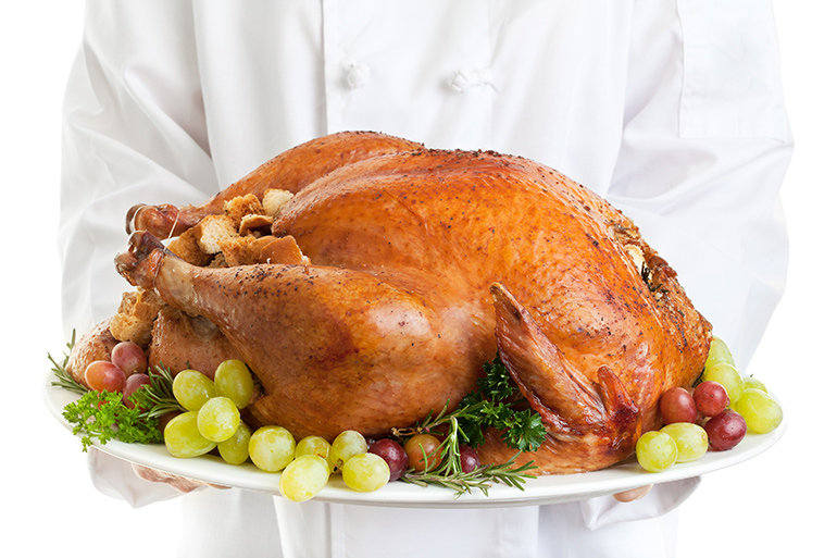 Chef holding turkey