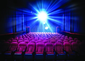 Movie Theater with empty seats and projector / High contrast image