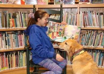 Isabelle reads to Wally