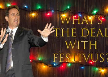 Christmas background. planked wood with lights and free text space Jerry Seinfeld festivus