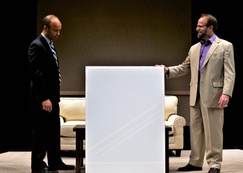 Antoine Jones and Steve Ayle with the white painting in Theatre Three's play 