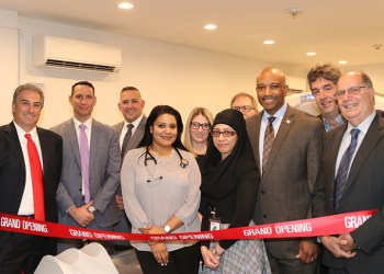 (L to R) Dominick Scarglato, Anthony Tirino and Angel Salcedo of GE Healthcare; Dr. Deepali Sharma; Dr. Kelly Miller; Radiology Manager Ana Pakal; Dr. Louis Avvento; Suffolk County Sheriff Errol Toulon Jr.; Southampton Town Attorney James Burke; and Congressional Aide Ben Monachino. Photo: Barbara Lassen