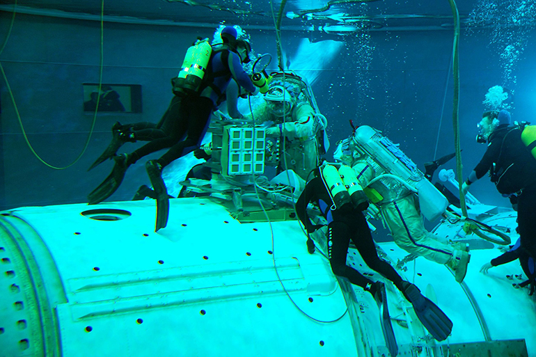 Astronauts pool training for the International Space Station, ISS