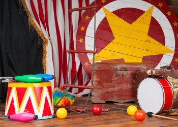 Circus backstage in retro style, drum suitcase. Interior