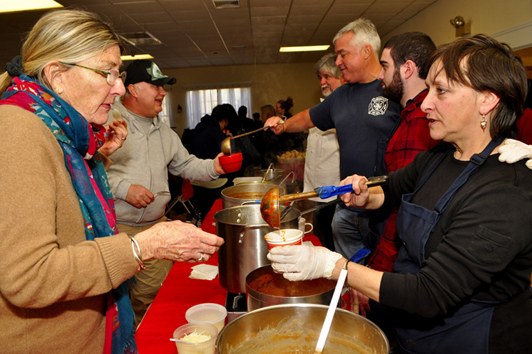 Jenny Ellis serving soup at the Empty Bowls benefit, Photo: Gianna Volpe