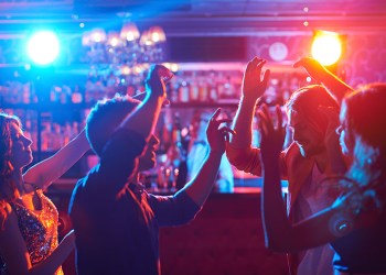 Young people dancing at a nightclub