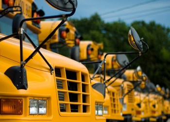 Fleet of school busses - a bus driver allegedly drove drunk and left the scene of two crashes