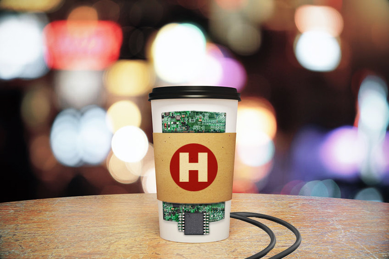 Hamptons Subway coffee in paper cup with wires and microchips