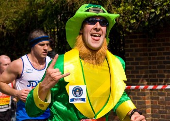 13537132 - london - april 22: unidentified people run the london marathon on april 22, 2012 in london, england, uk. the marathon is an annual event.