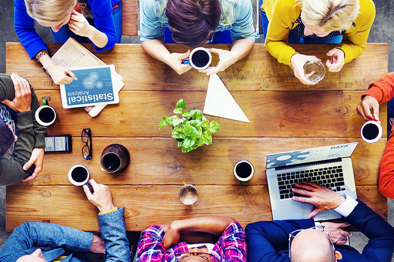 group of business people discussing on a cafe