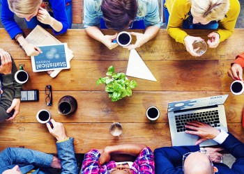 group of business people discussing on a cafe