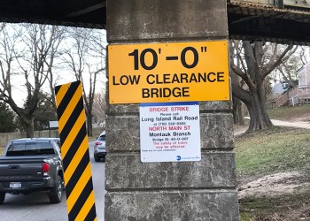 East Hampton railroad overpass sign