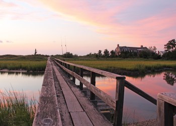 Sunset boardwalk Hamptons