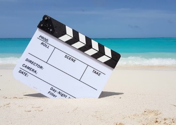 Maldives beautiful beach background white sandy tropical paradise island with blue sky sea water ocean 4k clapperboard film slate action cut