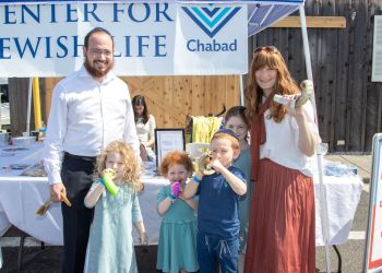 Rabbi Berel Lerman and Brocha Lerman with their children