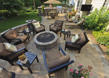 Back yard gardens and patio from an elevated view.