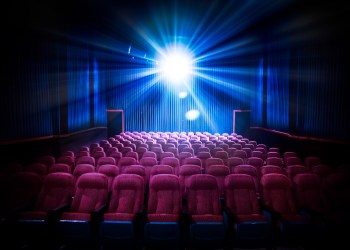 High contrast image of empty movie theater seats